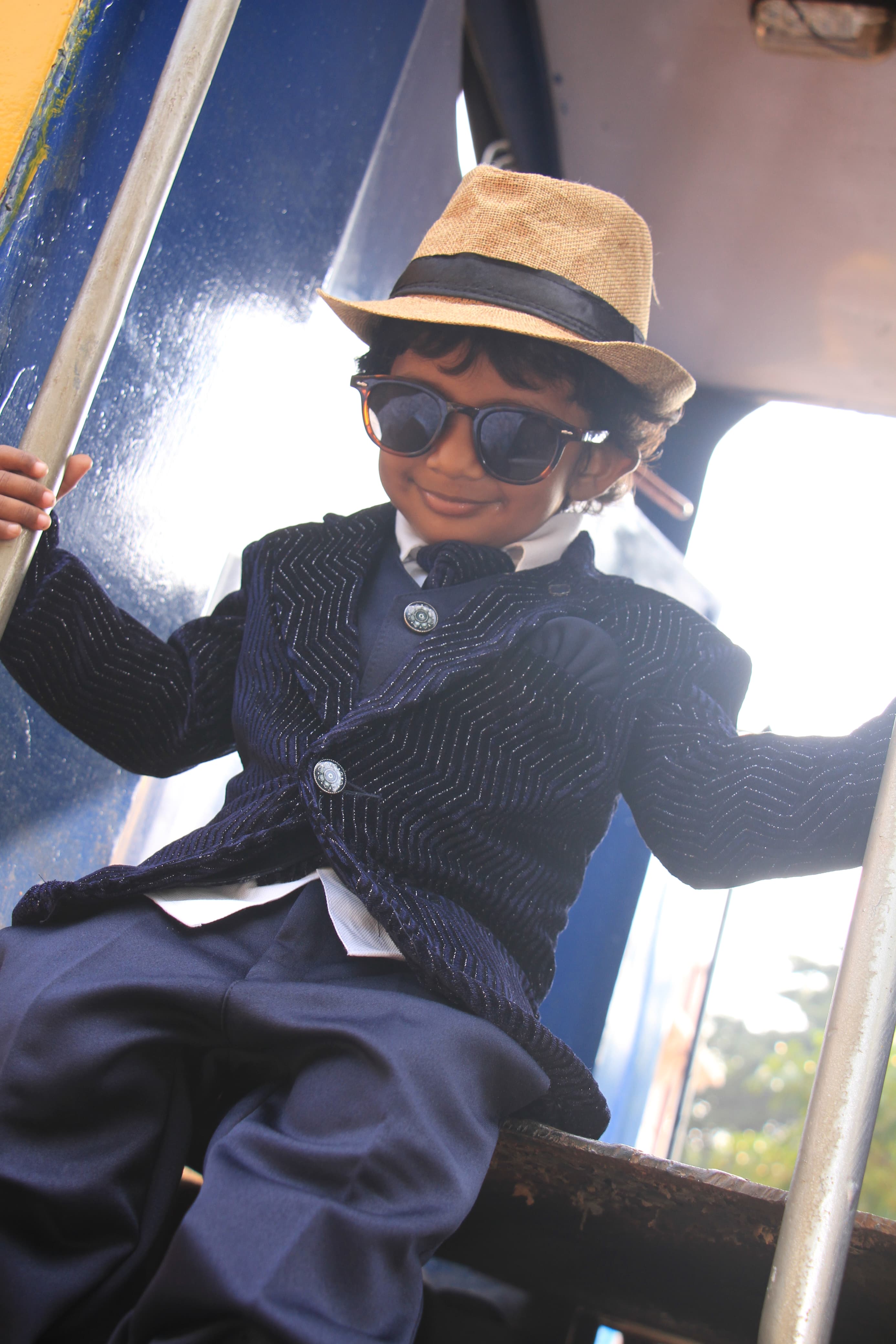 Baby dressed in adorable baby clothes for a photoshoot